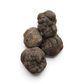Truffes fraîches Tuber brumale de catégorie EXTRA, à la surface foncée naturellement texturée