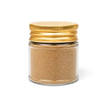 Poudre de truffe d’été (Tuber aestivum) dans un bocal en verre transparent à couvercle jaune
